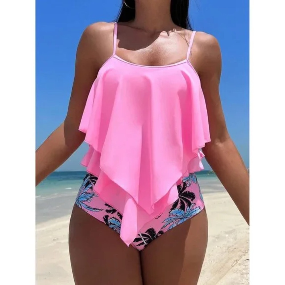 2 pc swimsuit: bright pink top & multi colored bottom. Spring Break Ready!!
NWOT